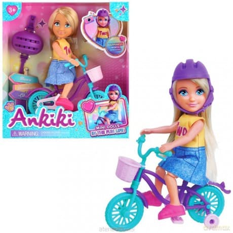 Lalka dziewczynka z kaskiem na rowerze